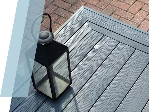 A black lantern on a UPVC deck
