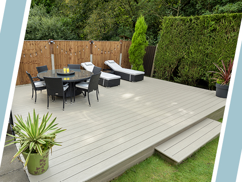 UPVC decking with a table and sunbeds